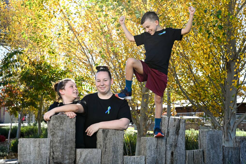FAMILY: Hannah Wilson, 11, Vanessa Engel and Liam Wilson, 9. Liam and Hannah were born with a rare genetic condition Neurofibromatosis. Pictures: MARK JESSER 