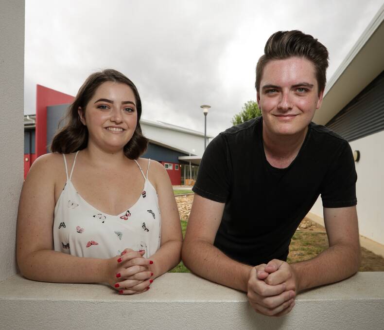 PROUD: Harry Smith, pictured with his twin Amy, was one of 18 students statewide who had works chosen for publication in the 2018 HSC Young Writers Showcase anthology. 