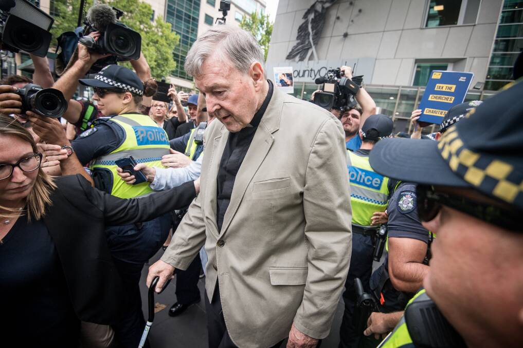 Cardinal George Pell leaving the County Court where was found guilty of historic sexual offences. Picture: Justin McManus 