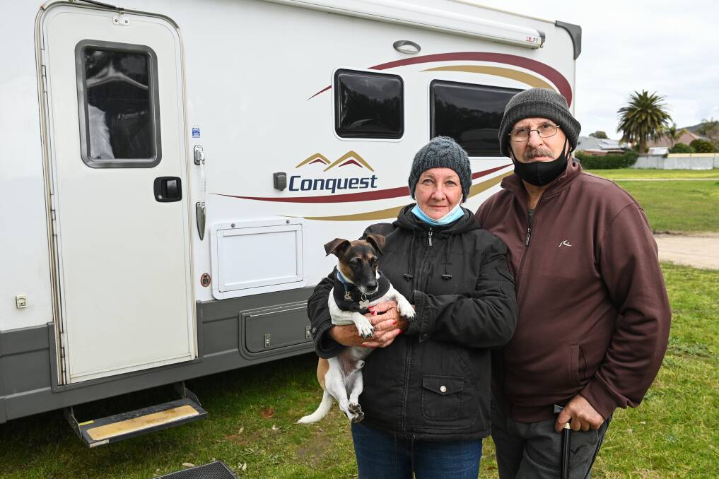 UNJUST: Terry Holmes and Noelene with dog Buck. The trio were stranded in NSW for 14 days when the Victorian border closed to residents this year. Picture: MARK JESSER