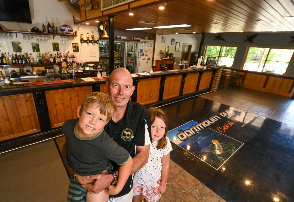 OPEN FOR BUSINESS: Dartmouth Hotel owner Aaron Scales with his children Preston, 5, and Mia, 8, at the pub. Pictures: MARK JESSER