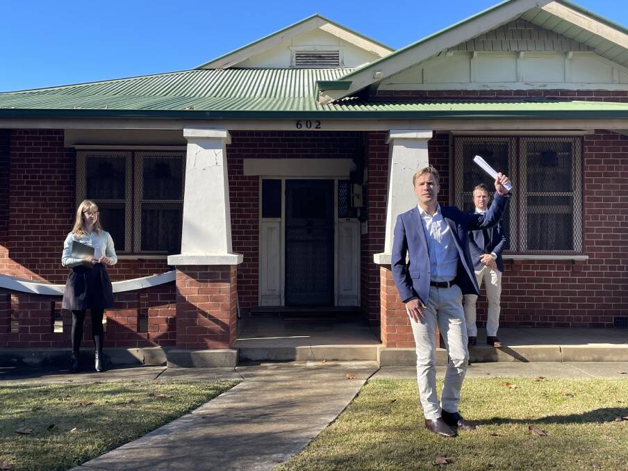 Stean Nicholls' Jack Stean auctioning 602 David Street. The home sold for $1.19 million. 