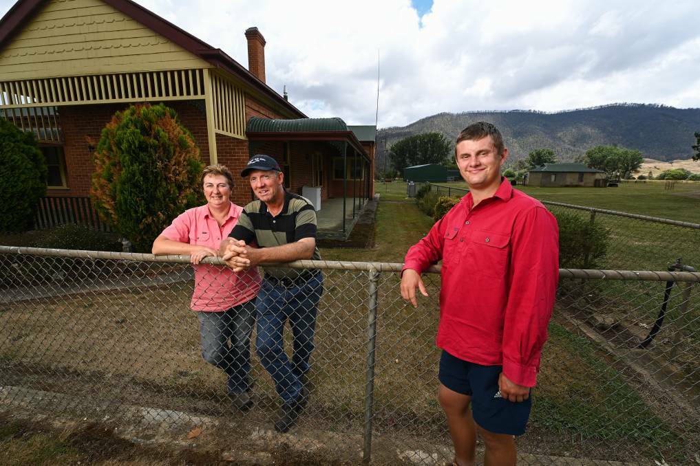 GRATEFUL: Bev and Rowan Surtees and their son Harry passed on their 'thanks' to one of the brigades that responded to their properties during the Upper Murray fires. Picture: MARK JESSER