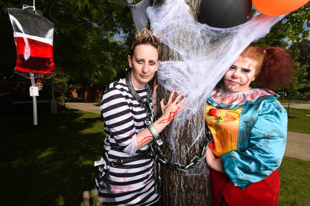 Wodonga TAFE's Cathy Prior and Chloe Lade get into the Halloween spirit in 2019. 
