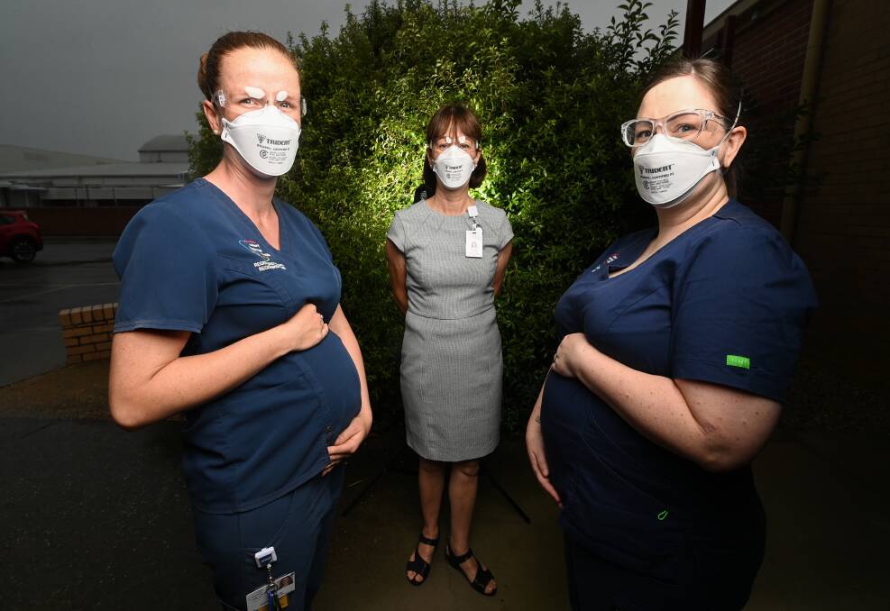 ABY BOOM: Registered nurse Sam O'Donoghue , AWH Director of Women's and Children's Services, Julie Wright and Clinical nurse specialist Kim Hall. The ward has seen an influx of pregnant nurses. Picture: MARK JESSER 
