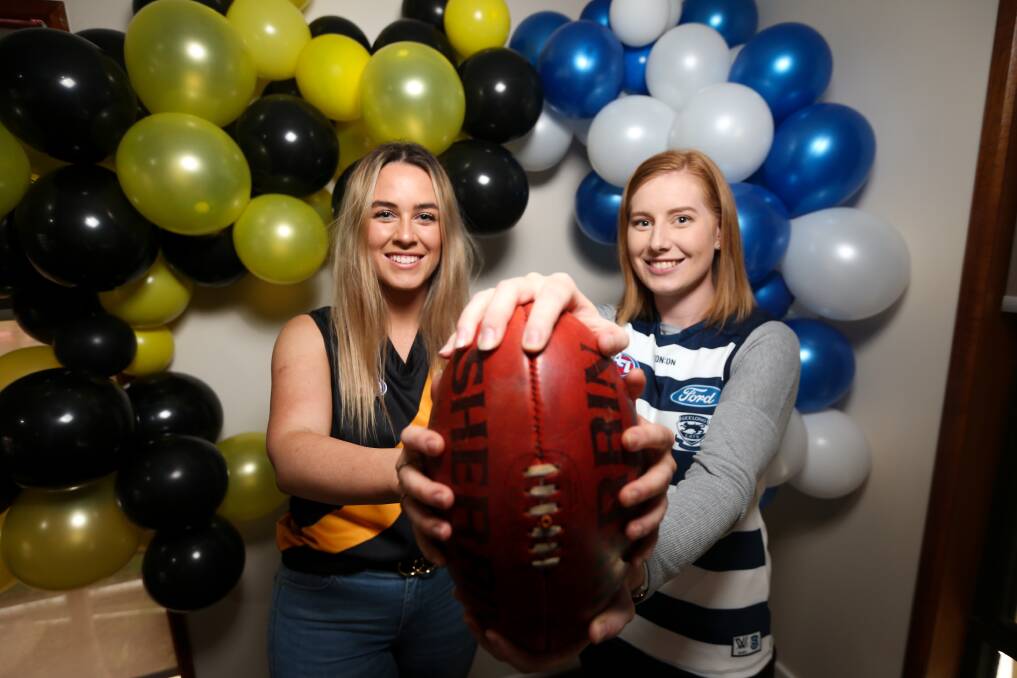 FINAL COUNTDOWN: Gabbie Star and Rachael Ralph celebrated the Grand Final during an at times tense evening together. Picture: JAMES WILTSHIRE
