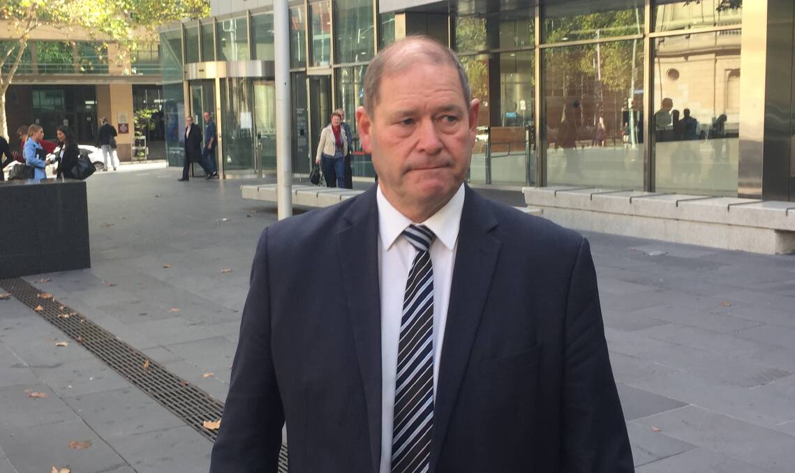 FREE TO GO: Tim McCurdy leaves the County Court at Melbourne on Wednesday after being found not guilty of five charges. Picture: BLAIR THOMSON
