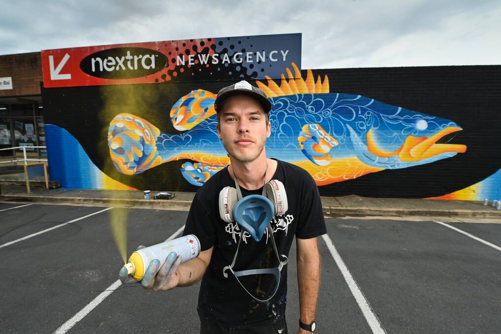 NEW LOOK: Lukas Kasper, known artistically just as Kasper, is painting a number of murals across the Border in the lead up to the 2021 two cities one community Upstream festival in March. Picture: MARK JESSER