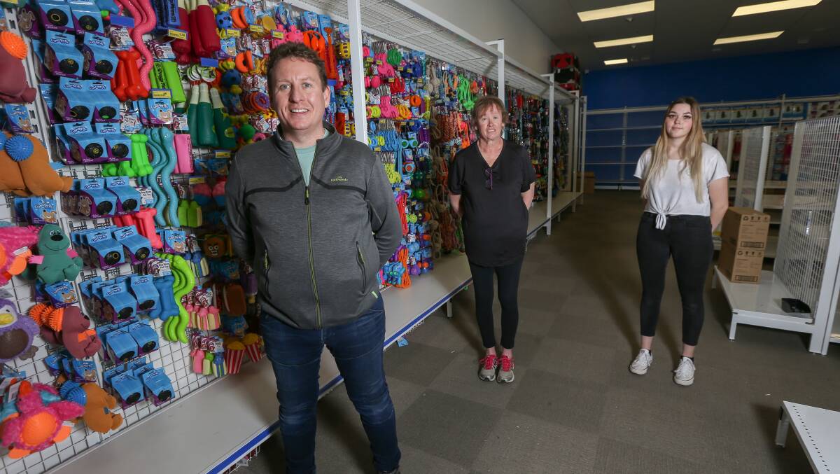  BRIGHT: Store manager Craig Robinson with staff Andrea Bahr and Jess McIntosh. The trio are working hard to transform the former-Harris Scarfe store into Cheap as Chips ahead of its opening. Picture: TARA TREWHELLA