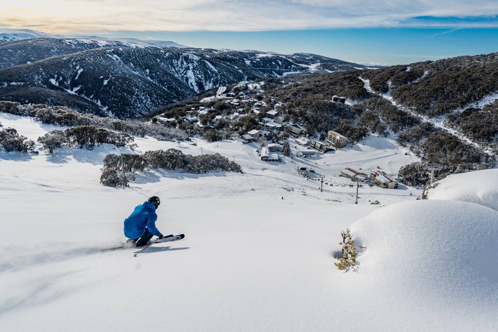 WHITE SNOW, BLUE SKIES: Skier Oscar Johnstone takes on the slopes at Falls Creek in July. Falls Creek resort reported increased visitation in the 2019 season. Picture: NATHAN FENTON 