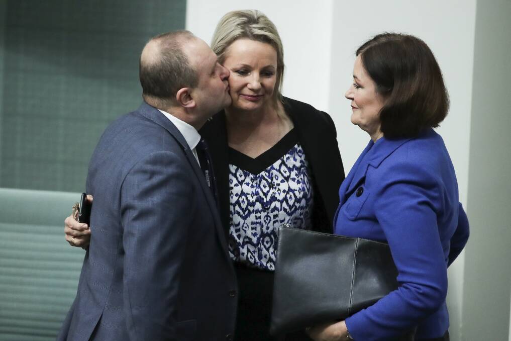 STAND:  Jason Wood and Sarah Henderson congratulate Sussan Ley after the introduction of the Live Sheep Long Haul Export Prohibition Bill 2018. Picture: ALEX ELLINGHAUSEN 