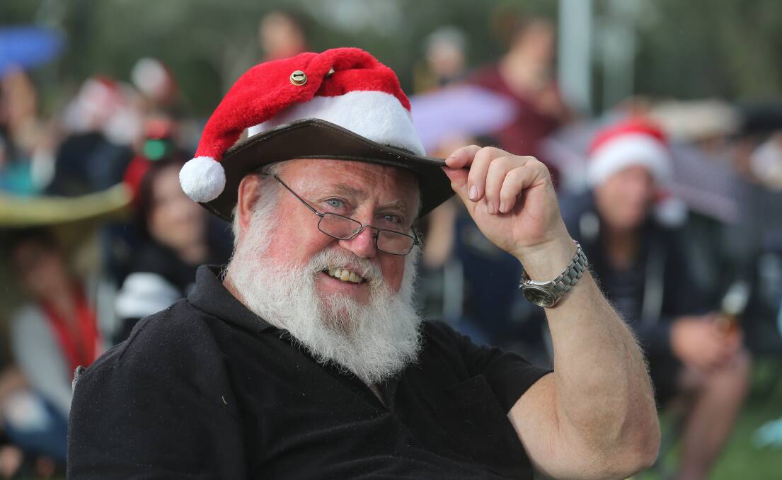 ONLY DAYS TO GO: Wodonga's Mark Thompson embracing the festive season at the Wodonga Carols by Candlelight. The Bureua of Meterology have predicted a hot Christmas Day in Albury-Wodonga Picture: KYLIE ESLER