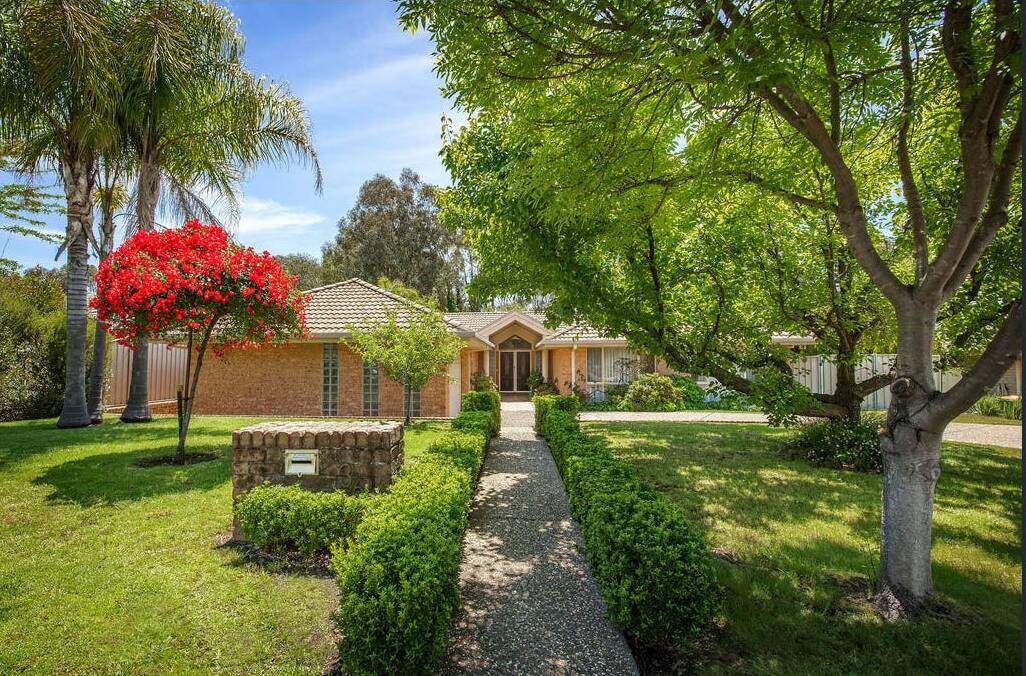 HUGE INCREASE: 36 The Avenue, Thurgoona, sold for $900,000 on Thursday at an auction conducted by Grahame Gould of Chapman Gould and May