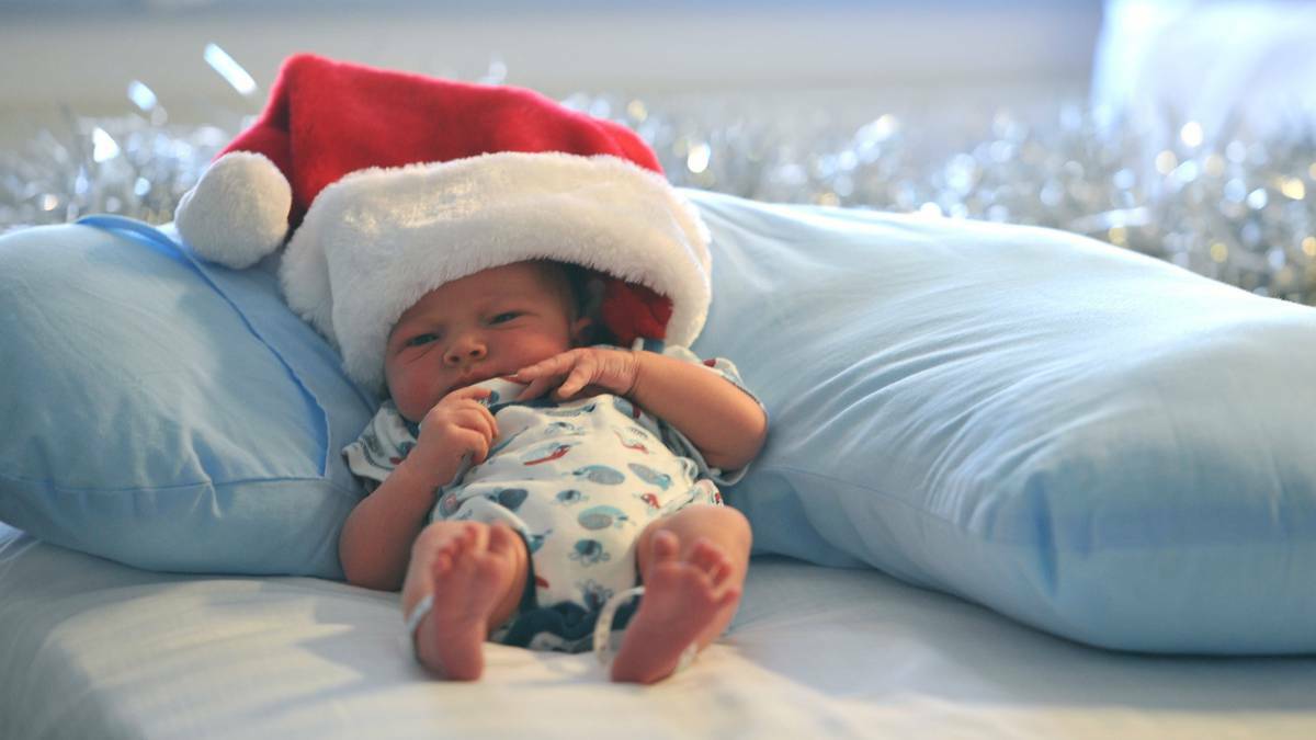Levi James looks cosy in his Santa hat. His arrival on Christmas Day had mum and dad Leeza and Paul Macauley, of Wagga, one of the best presents. Levi was born at Calvary Hospital at 2.32pm weighing 7 pound, 14 ounces. Photo: ADDISON HAMILTON