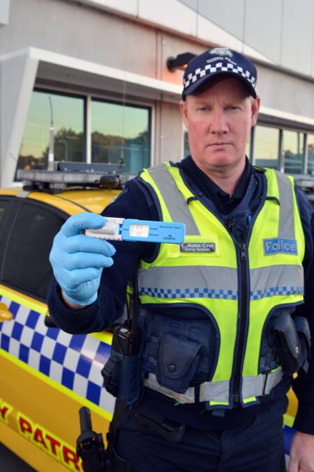DRUG TESTING: Acting Sergeant Kevyn Hume-Cook. Picture: LIZ FLEMING