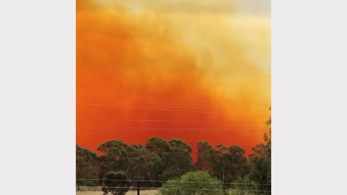 FALLOUT: The sky above Mount Arthur Mine near Muswellbrook turns a bright orange due to the toxic fumes.