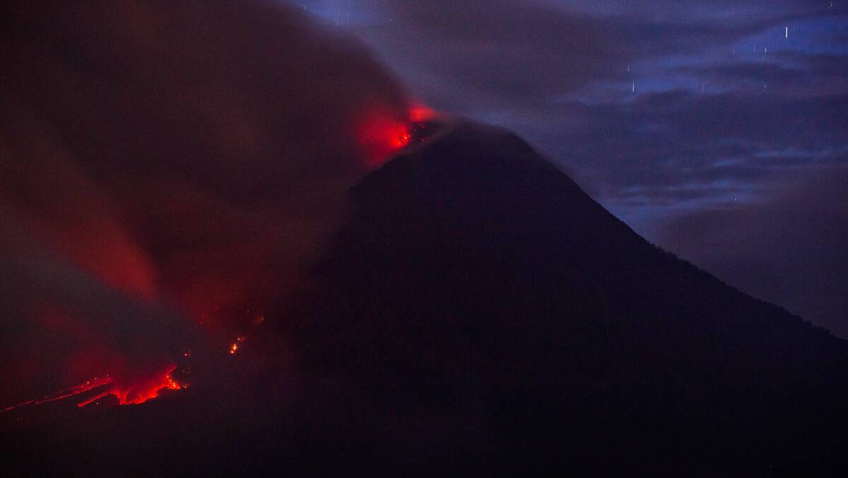 Hot lava runs down Mount Sinabung from a lava dome on January 3, 2014 in Karo District, North Sumatra, Indonesia. Picture: Getty