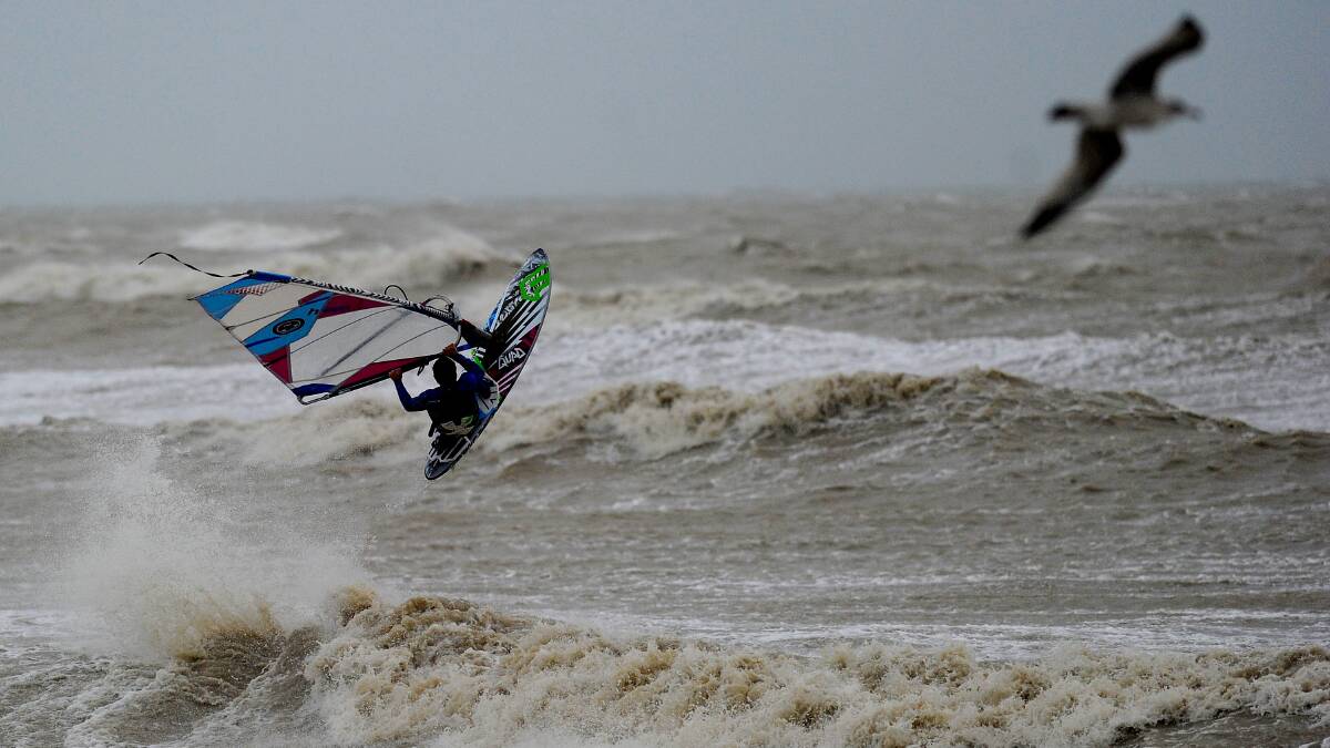  A windsurfer braves the elements as strong winds and heavy rain hit England and Wales on January 03, 2014 in Goring, England. Picture: Getty