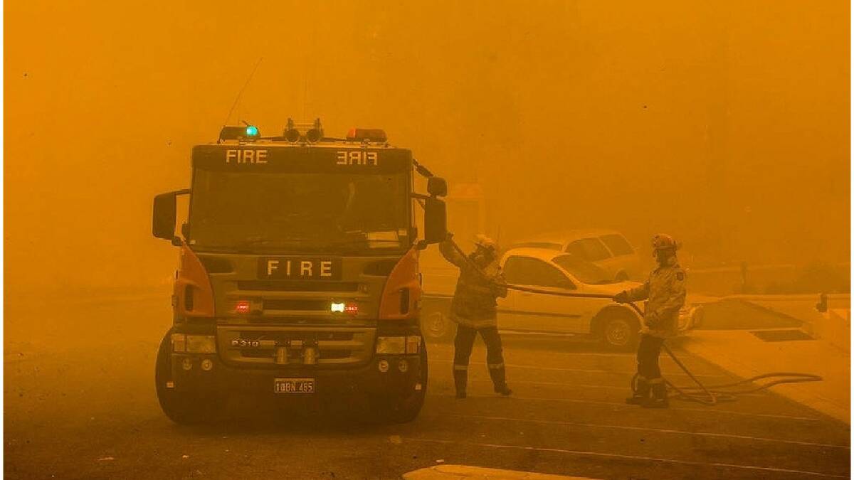 Firefighters battled against a devastating bushfire in Perth's hills. Photo: DFES.