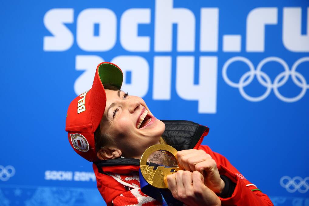Gold medalist Darya Domracheva of Belarus celebrates during the medal ceremony for the Biathlon Women's 15km Individual on day 8 of the Sochi 2014 Winter Olympics at Medals Plaza on February 15, 2014 in Sochi, Russia. Photo: GETTY IMAGES