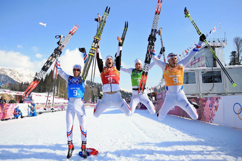 (L to R) Ivan Perrillat Boiteux, Jean Marc Gaillard, Maurice Manificat and Robin Duvillard of France celebrate winning the bronze medal in the Men's 4 x 10 km Relay during day nine of the Sochi 2014 Winter Olympics at Laura Cross-country Ski & Biathlon Center on February 16, 2014 in Sochi, Russia. Photo: GETTY IMAGES
