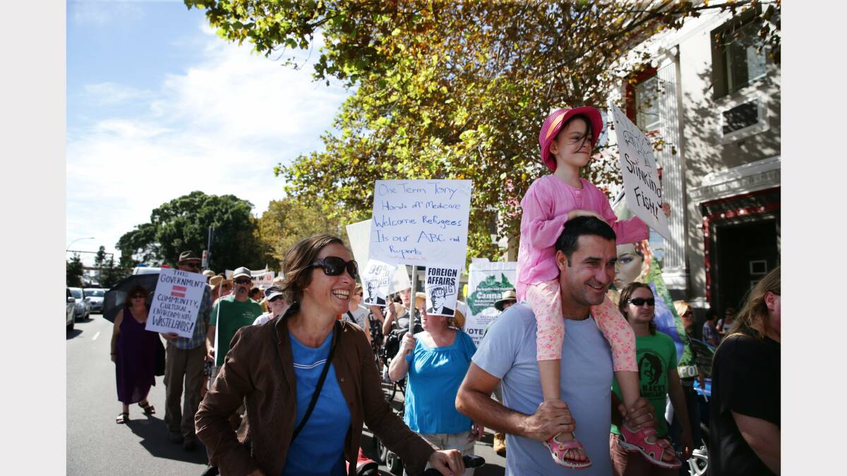 Scenes from the March in March protest against the Abbott government held in Newcastle on Sunday morning. Picture: Dean Osland 
