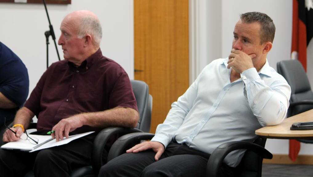 COMMUNITY CONCERN: Northern Territory government select committee member Gerry Wood and chair Nathan Barrett listen to community testimony at a hearing into ice usage in Katherine on Tuesday. 