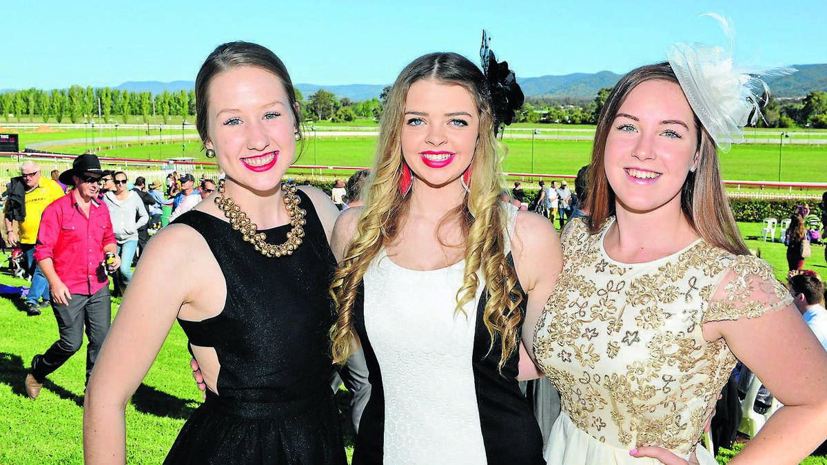 MUDGEE: Easter Sunday races drew a great crowd to the Mudgee Racetrack. Enjoy the action were Alex Ashton, Mikaela Gilchrist and Chloe Devine. Photo: Mudgee Guardian.