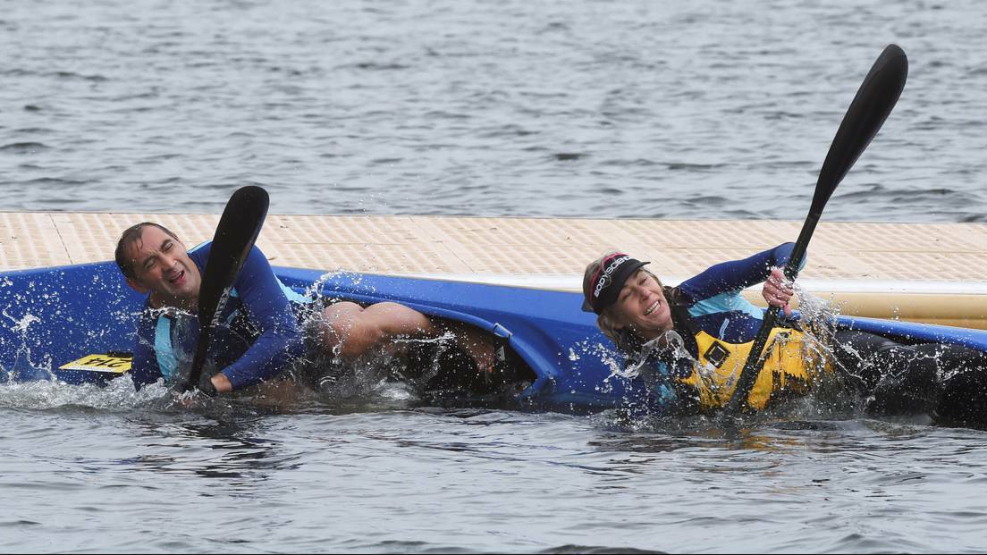 BALLARAT: David Little and Pauline Findlay capsize on day two of the Australian Canoe Marathon Championships at Lake Wendouree. Photo: The Courier.