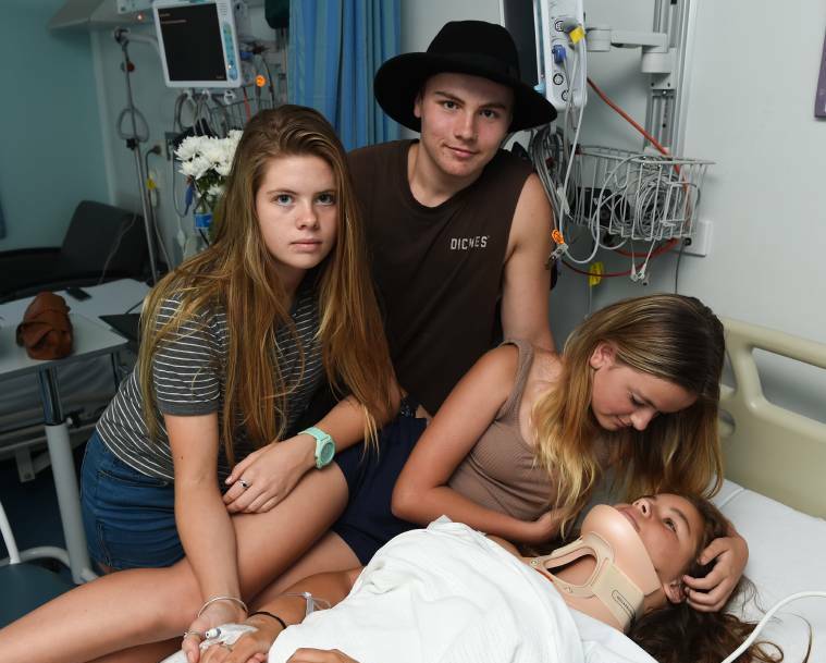SUPPORT: Gypsy Harmer, 15, with sister, Kavina, 16, Isaac Montgomery, 16, and Jessica Hooper, 14. Picture: MARK JESSER
