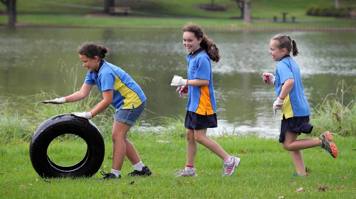 Wodonga Girl Guides Cameron Orr, 9, Amy Cooper, 10, and Savannah Bandsma, 9, were among more than half-a-million Australians giving up their time yesterday to clean up other people’s rubbish. The girls spent their Sunday removing all sorts of garbage from Sumsion Gardens, one of about 6000 clean-up sites nationwide. Picture: KYLIE ESLER