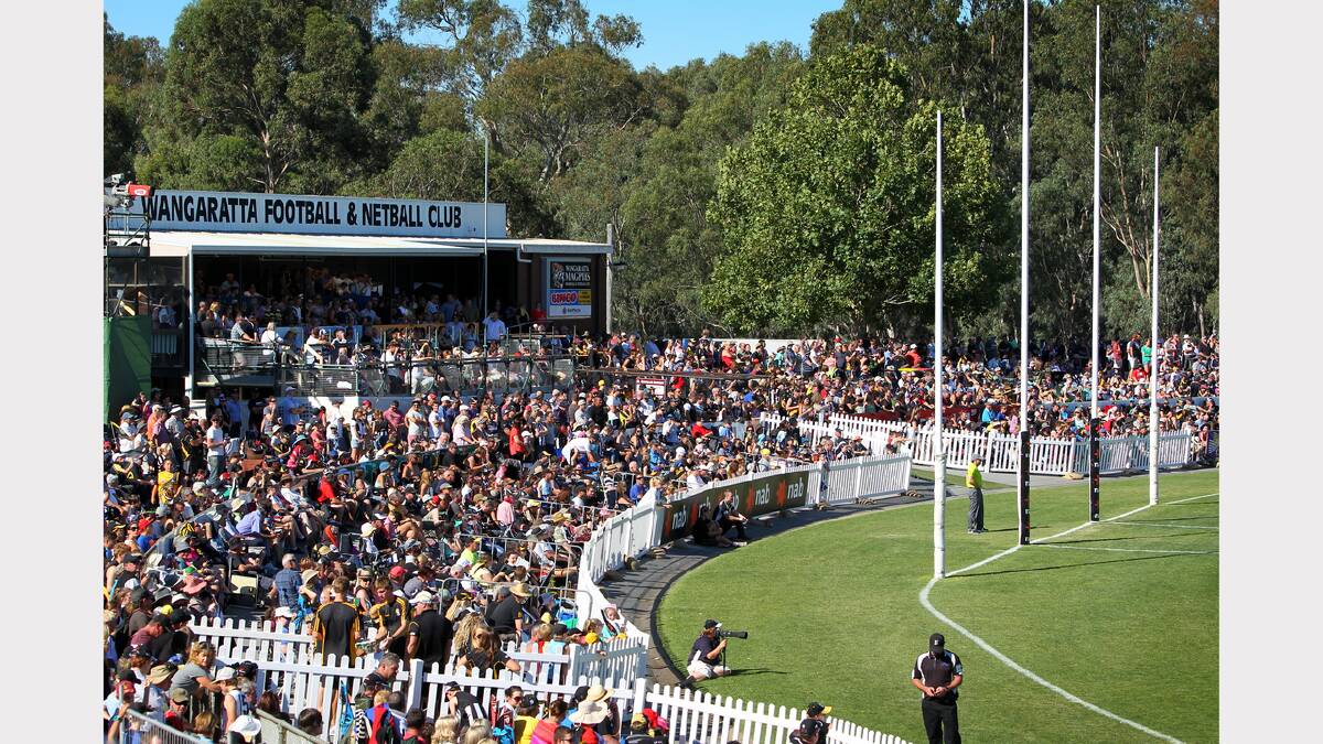 The crowd laps up the action at the Norm Minns Oval, Wangaratta.