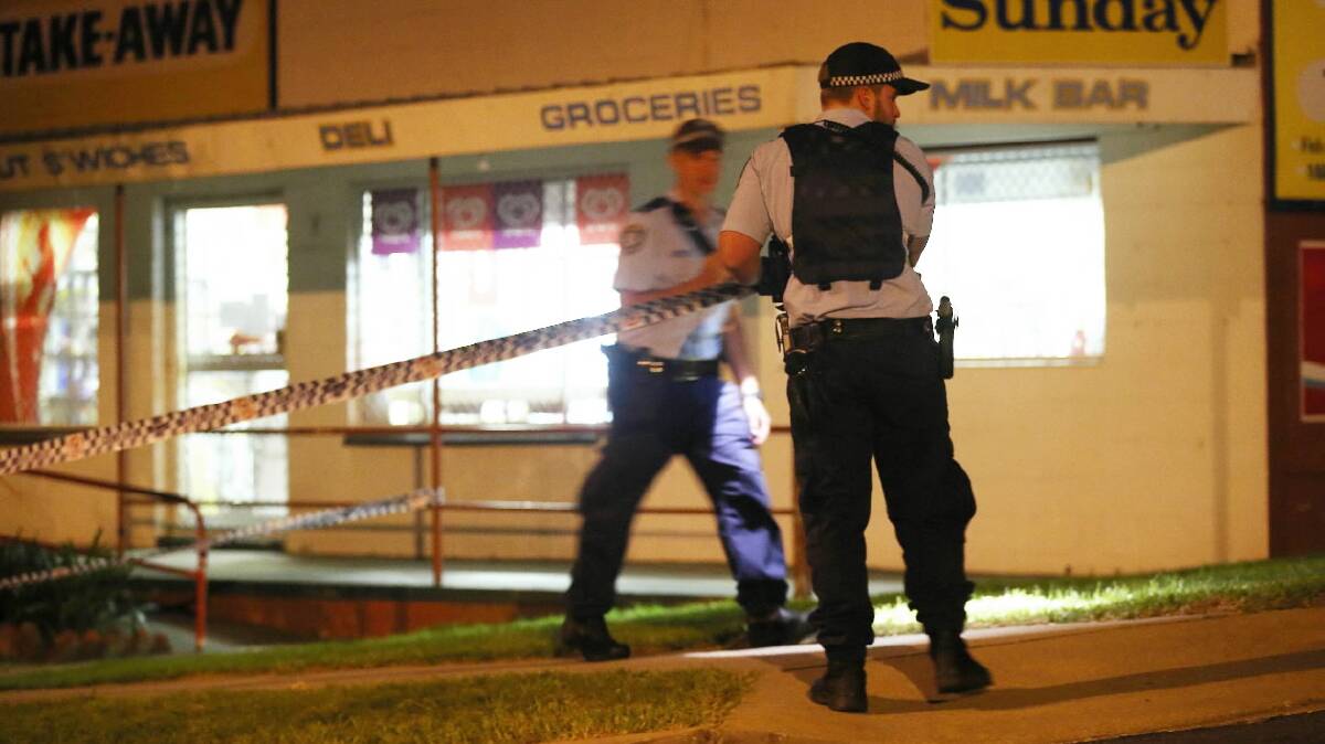 Police at the scene of the hold-up on Tuesday night.