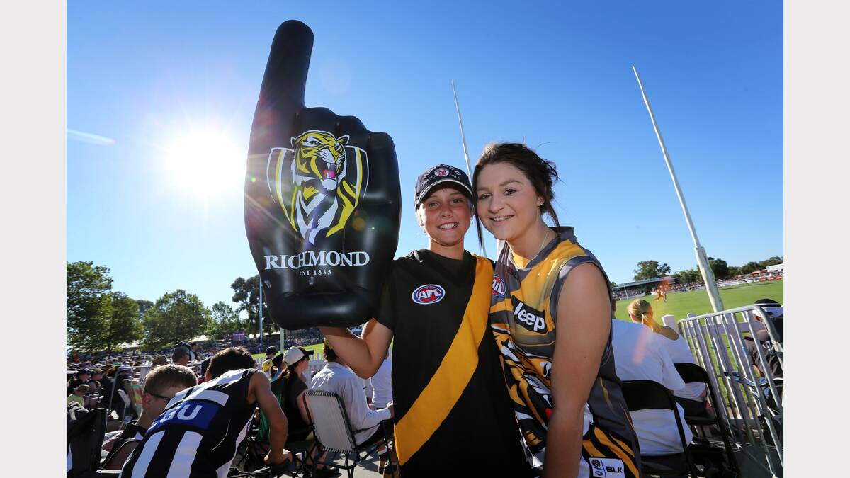 Jack McKinley, 10, and Chelsey Allan, 18, of Wangaratta, Tigers fans at the Norm Minns Oval, Wangaratta.