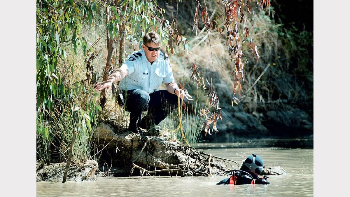 Wodonga  -  Water Parkland Homicide squad and police divers search the area where the body of  Aubrey Maurice Broughill  was found. Picture: KATE GERAGHTY