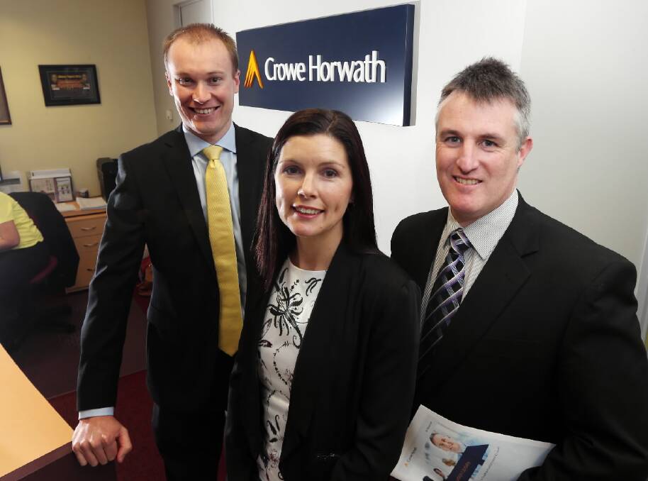 Ryan Muntz, Kylie Smith and Chris Green, are delighted to hyave been made partners at Crowe Horwath. Picture: PETER MERKESTEYN 