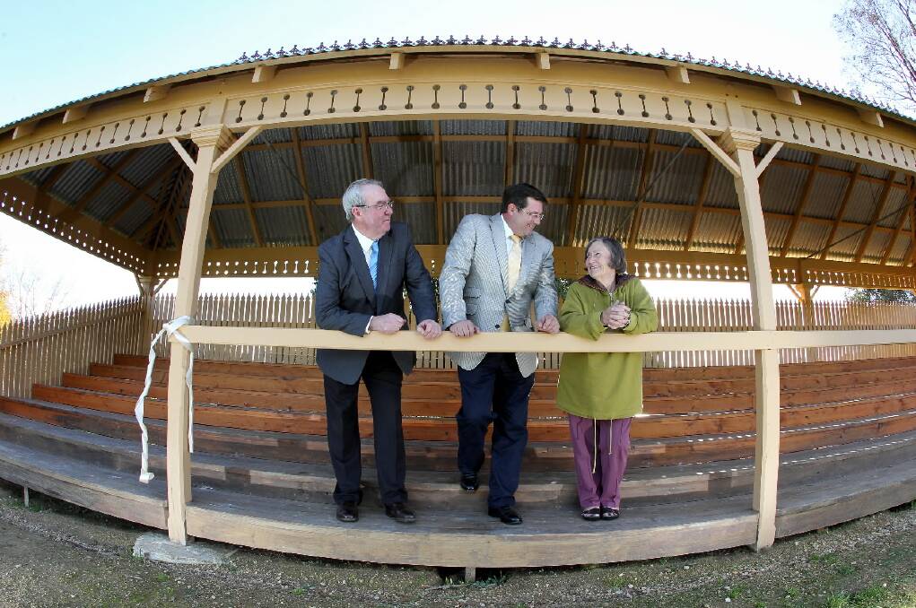 Indigo mayor Bernard Gaffney and Bill Tilley admire the restored Chiltern Recreational Park Reserve grandstand with Joy Lee, who drove the project for the reserve committee. Picture: KYLIE ESLER
