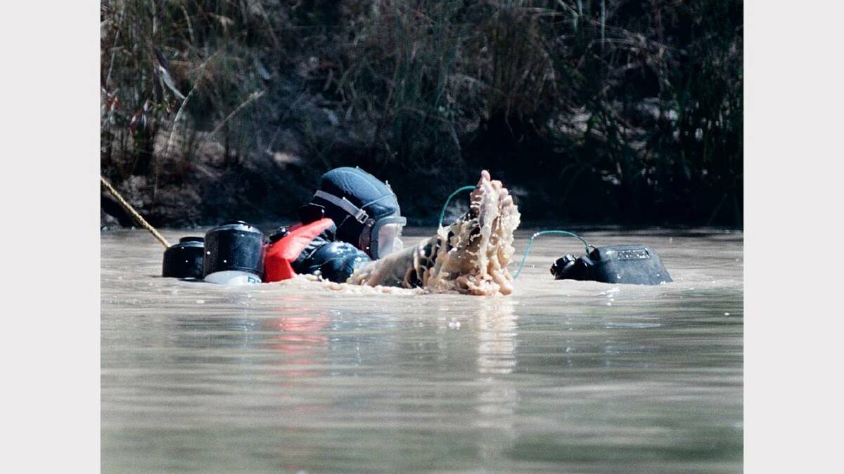 Wodonga  -  Water Parkland Homicide squad and police divers search the area where the body of  Aubrey Maurice Broughill  was found. Picture: KATE GERAGHTY