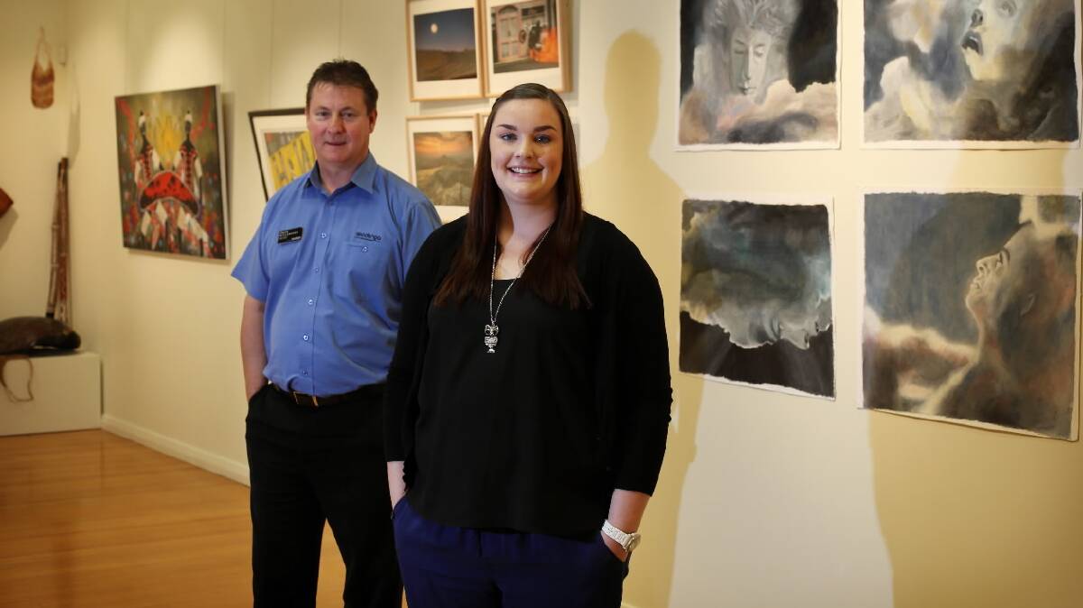 Craig McClanahan and Marnie Teal, staff members of Wodonga Council, have contributed artwork to an exhibition, My Secret Art Life, being held at Arts Space Wodonga. Picture: MATTHEW SMITHWICK 