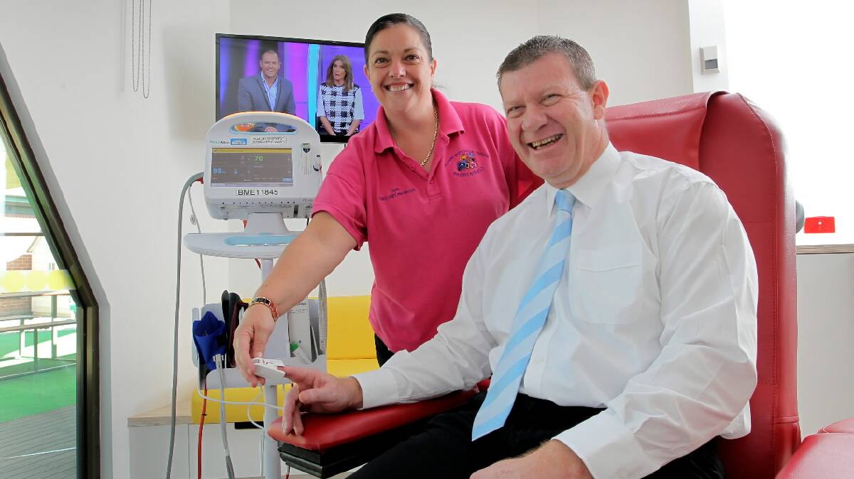 Commercial Club’s general manager Jeff Duck gives the new children’s ward equipment a test run under the supervision of unit manager Sam Peet. Picture: DAVID THORPE