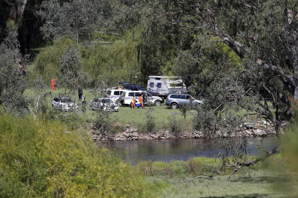 A man is missing after a kayak overturned on the Mitta River, just south of Lake Hume, yesterday. Police and SES crews search the area. Picture: JOHN RUSSELL