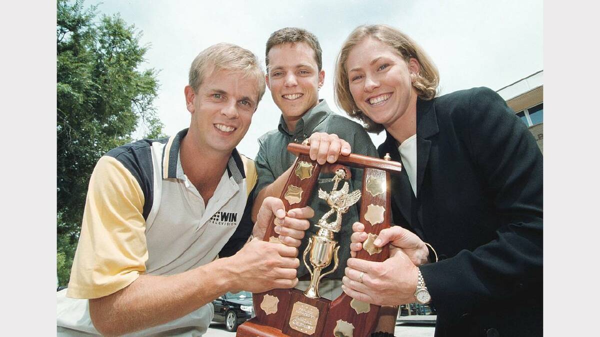 QEII Square, Albury. Pic re sunicrust  triathlon media challenge. Pictured: Darren Grigg, WIN Television, Nick Higgins, Border Mail and Tiffany Cherry, Prime Television, with trophy. Picture: PETER BATSON
