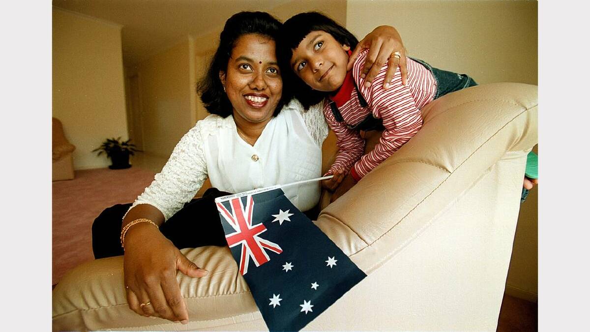 Newly naturalised citizen Vaani Kalaroopan with her daughter, Divia, 4, in Wodonga on Australia Day. Picture: CHRIS McCORMACK