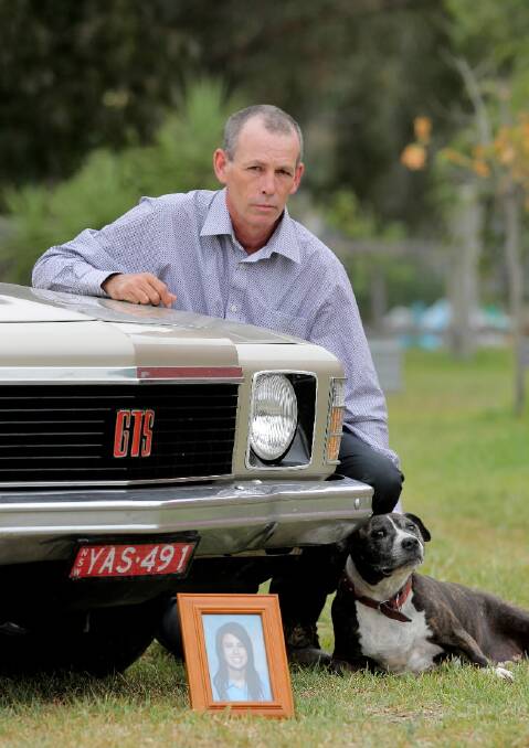 Max Duncan with the car he was rebuilding for his daughter, Yasmin, and her dog Liz.