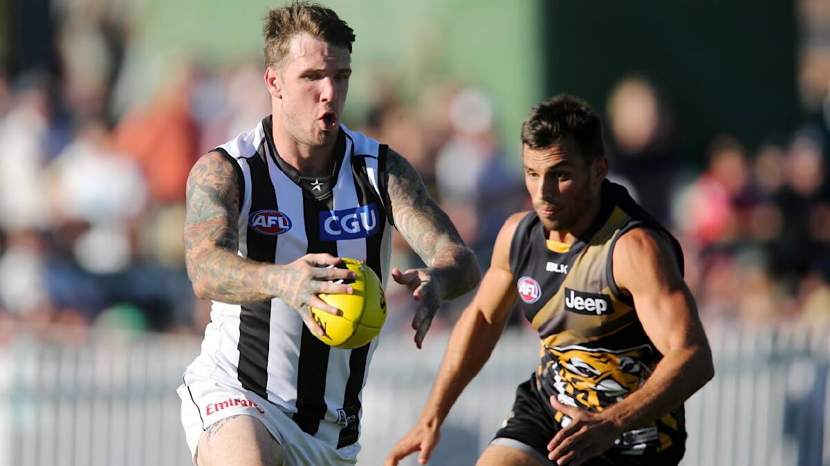 Dane Swan clears from the backline. Picture: FAIRFAX