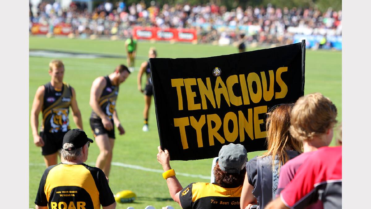 One Richmond supporter flies the flag for Tyrone Vickery at the Norm Minns Oval, Wangaratta.