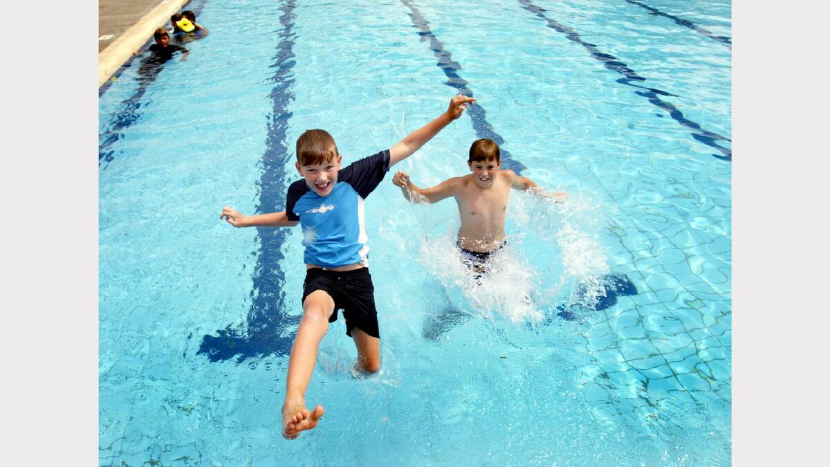 Jack Marshallsea, 9 and Tyla Windham, 12 get into the swing of things at the Albury Pool. Picture: DAVID THORPE