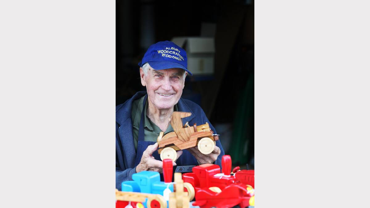 Woodworker Ed Kilo has been making items for over 25 years. Pictured with some of his wooden cars.