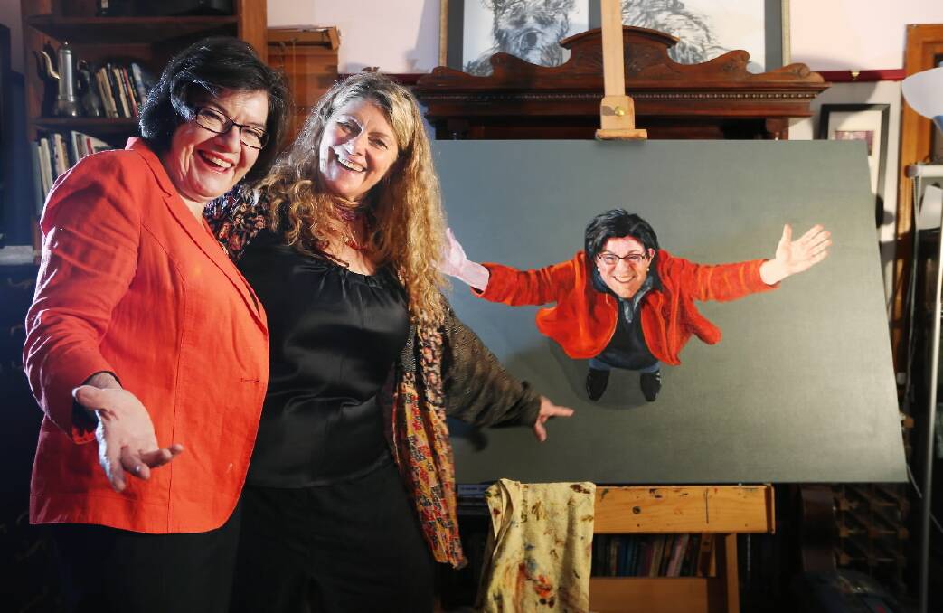 Cathy McGowan views Marijana van Zanten’s portrait of her that will be entered for the Archibald Prize. Picture: JOHN RUSSELL