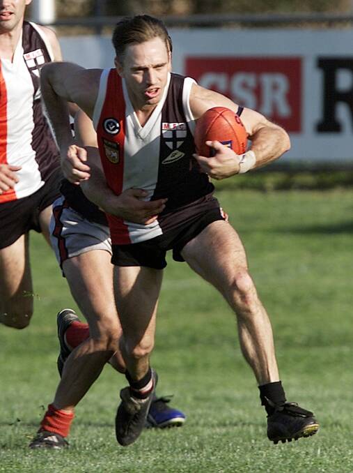 Scott Burgess in action against the Wodonga Raiders in the 2001 preliminary final.